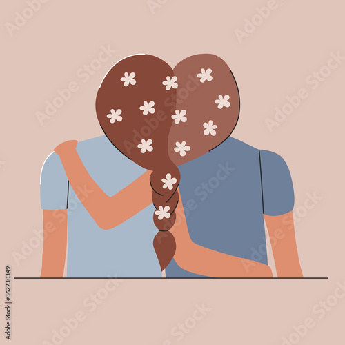 International Friendship Day. Hugs best friends with flowers in their hair
