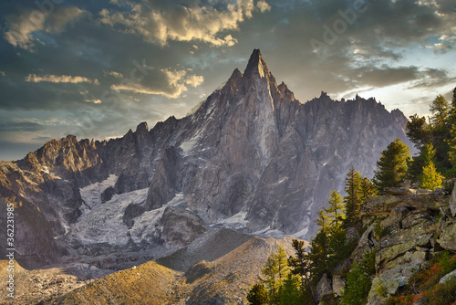 Autumn in the high mountains of the French Alps. Aiguille du Dru in the Mont Blanc massif near Chamonix, Haute-Savoie, France. photo