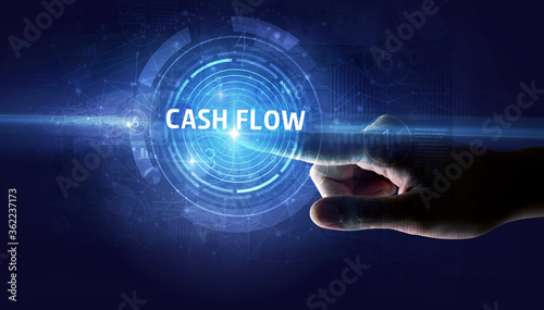 Hand touching CASH FLOW button, modern business technology concept