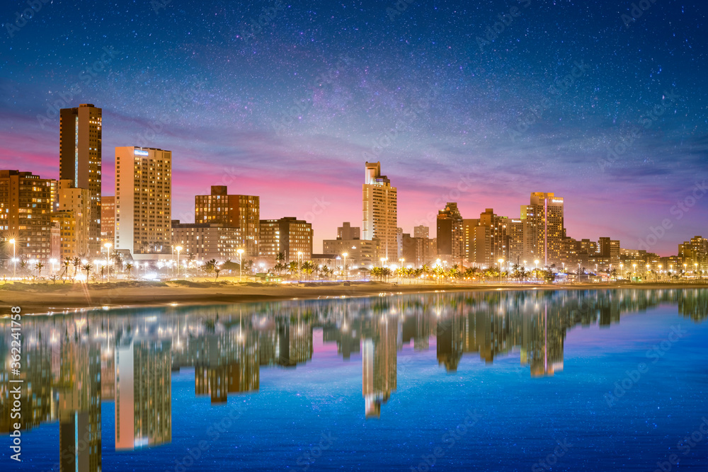 Durban city beachfront buildings lit up at night