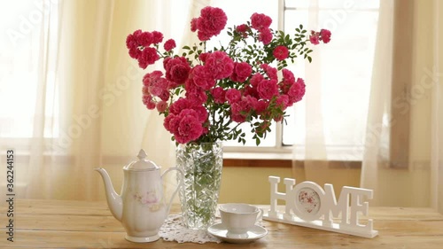 summer morning with the scent of roses and tea with milk