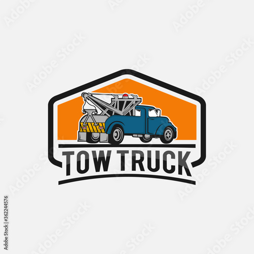 car tow truck emblems, labels and design elements,pickup truck logos, emblems and icons. Car service logotype design. Tow and wrecker truck. Pickup with snow plow.