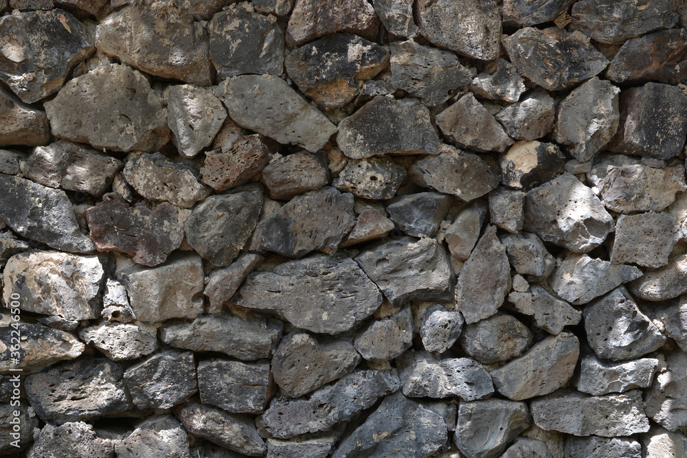 Stone wall. Ancient wall. Rocks. Wall. Background Stone wall. Ancient wall. Rocks. Wall. Background