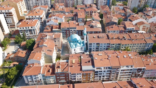 Aerial view of city ​​mosque between the buildings