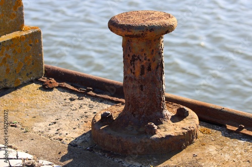 rusty anchor on the pier