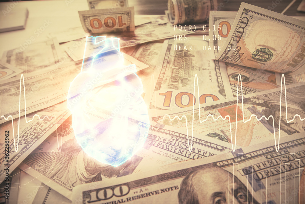 Double exposure of heart drawing over usa dollars bill background. Concept of medical education. Double exposure of heart drawing over usa dollars bill background. Concept of medical education.