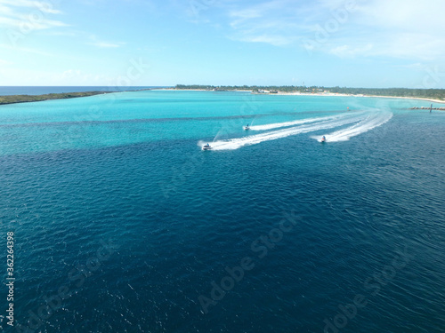 Personal watercraft sailing through blue ocean waters
