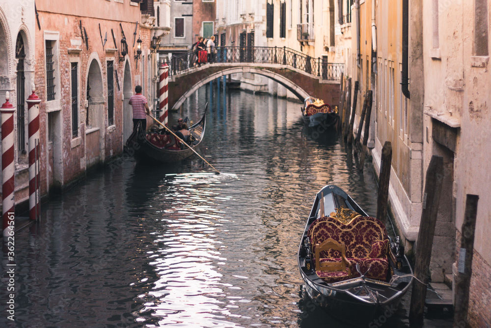 Narrow canal of Venice in Italy