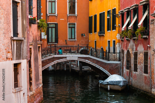 Narrow canal of Venice in Italy