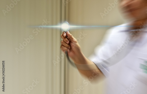 Close up of Hand doctor Holding Stethoscope. selective focus 