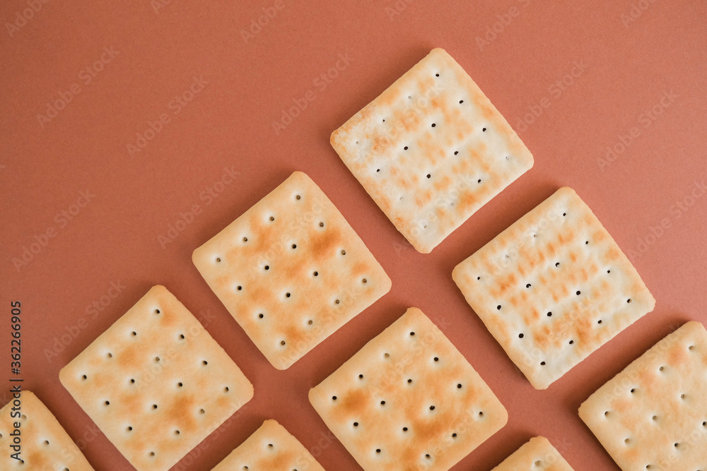 Baked cookies or crackers. Snacks concept. Food background.