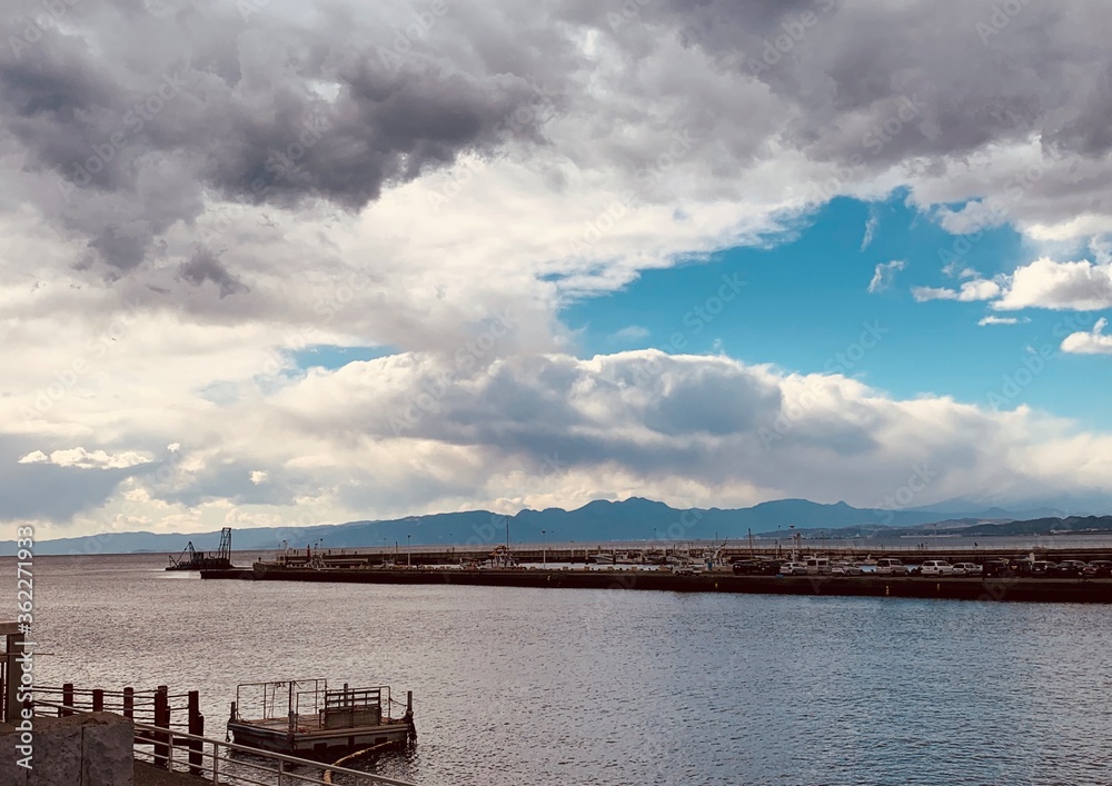 clouds over the island and mountain ranges