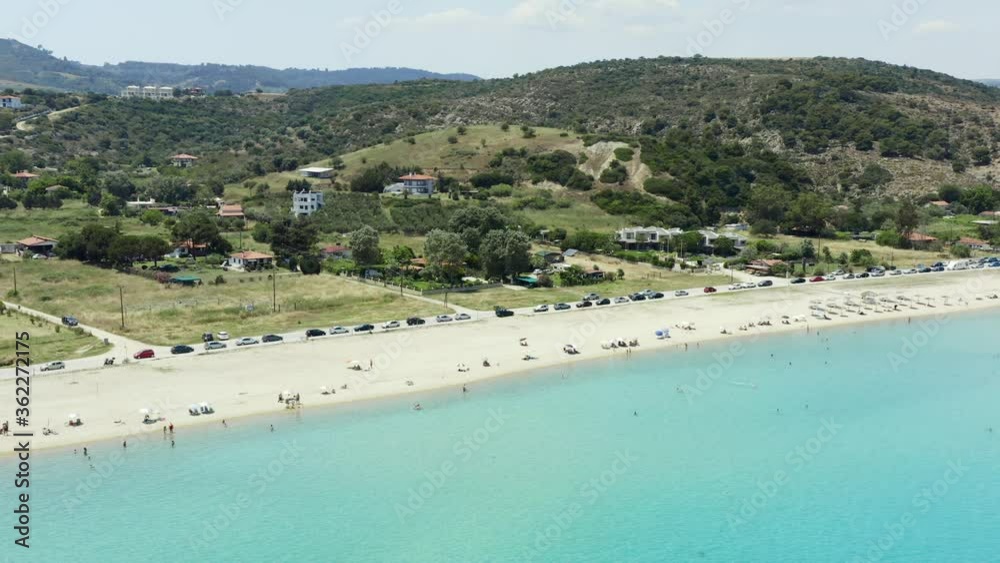 Aerial shot long beach with white sand - Ormos Panagias, at Chalkidiki peninsula, Greece. Aerial shot long beach with white sand - Ormos Panagias, at Chalkidiki peninsula, Greece.