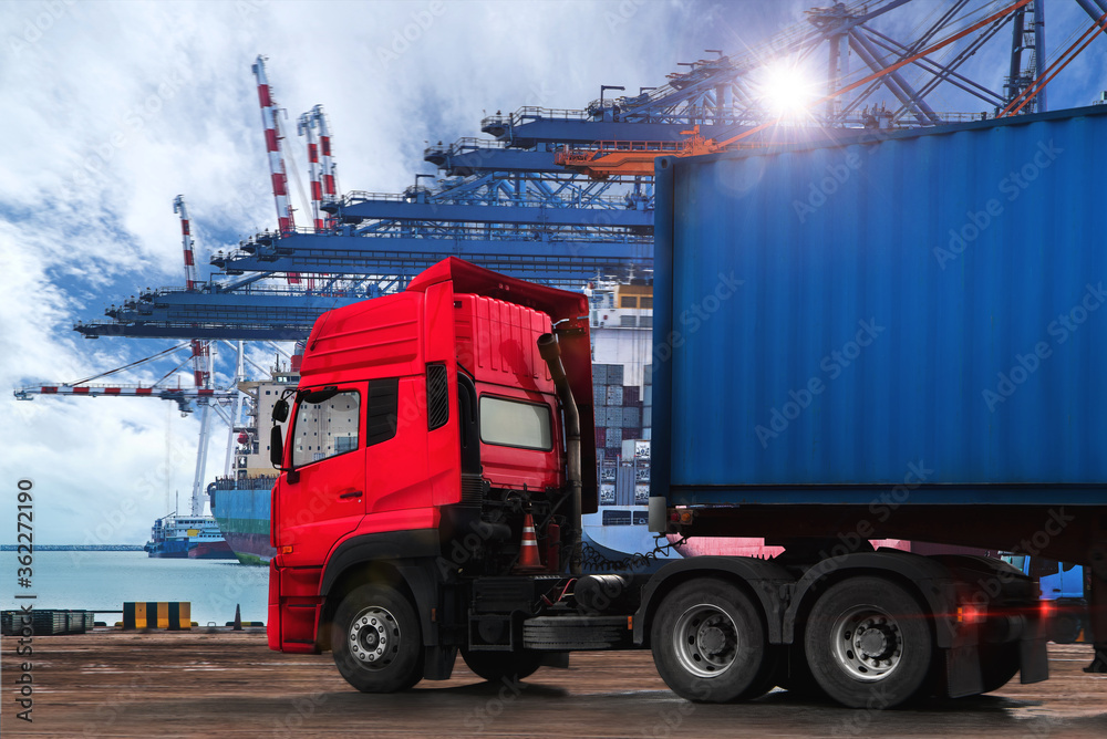 Truck transportation,import,export logistic industrial with beautiful sky and shipyard background,Thailand