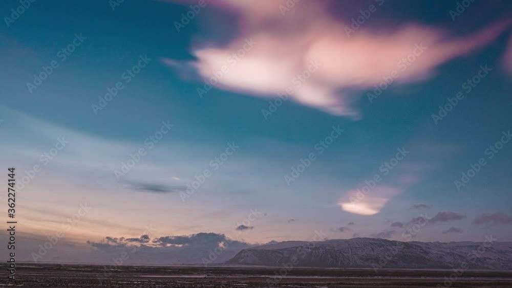 Polar Stratospheric Clouds During Sunset Over Vatnajokull Glacier Cap In South Iceland. - timelapse Polar Stratospheric Clouds During Sunset Over Vatnajokull Glacier Cap In South Iceland. - timelapse