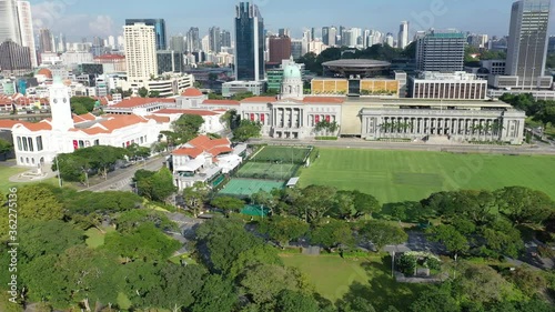 CBD, Singapore Mar 2020 4k Aerial video of Pandang Stretch of playing fields that has hosted many historic colonial & national events. during early morning  photo