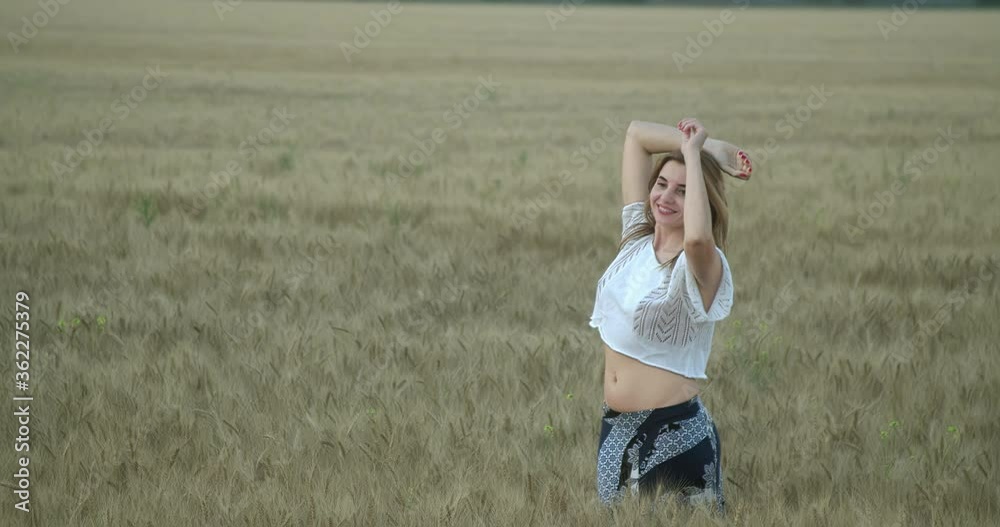 Girl rejoices in a wheat field Girl rejoices in a wheat field