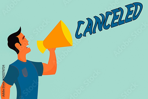 Handwriting text writing Canceled. Conceptual photo to decide not to conduct or perform something planned or expected Man in Shirt Standing Talking Holding a Megaphone Male Calling Out onto photo