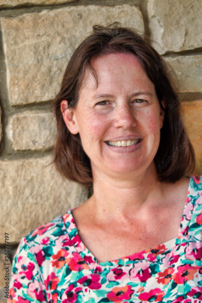 portrait of a smiling middle age woman portrait of a smiling middle age woman