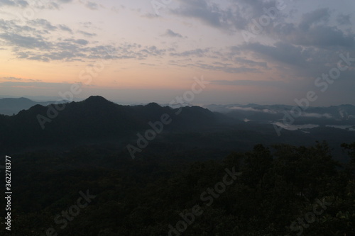 Beautiful landscape in the mountains at sunrise, Traveling concept background. © สมปอง ป้องปิด