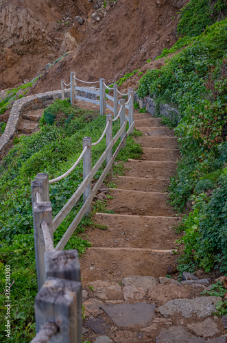 Access stairs to the Benijo beach, in the Anaga Rural Park, in Santa Cruz de Tenerife. Canary Islands. Spain..