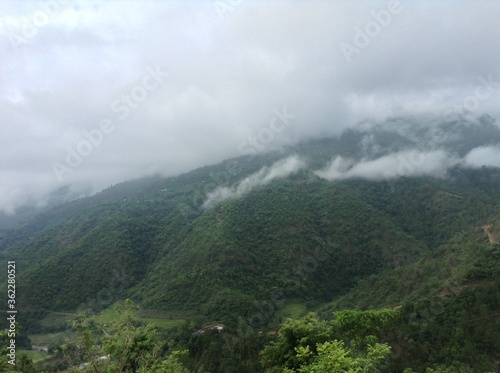 Beautiful green hill with beautiful cloud on the top