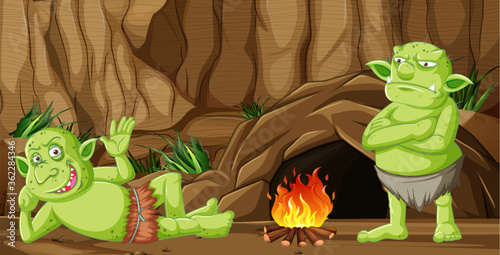 Goblins or trolls with cave house and camp fire in cartoon style