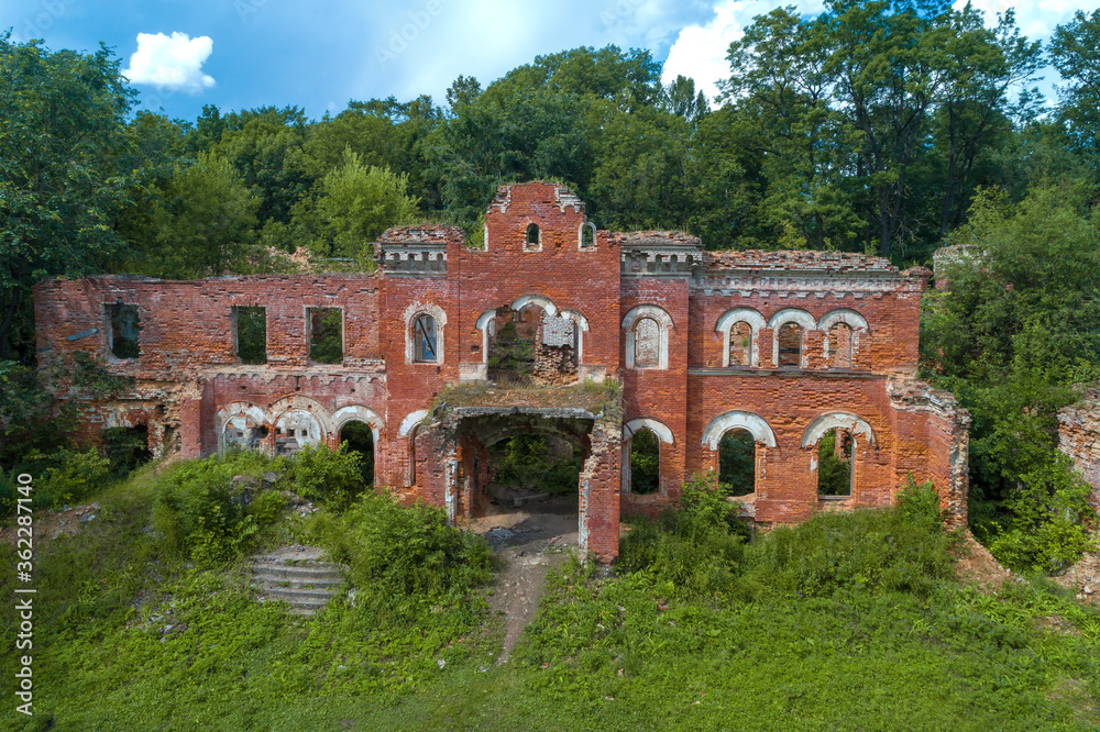 The ruins of the old house close-up sunny July day (shooting from a quadcopter). Torosovo. Leningrad region, Russia