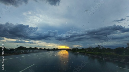 sunset over Highway after rain