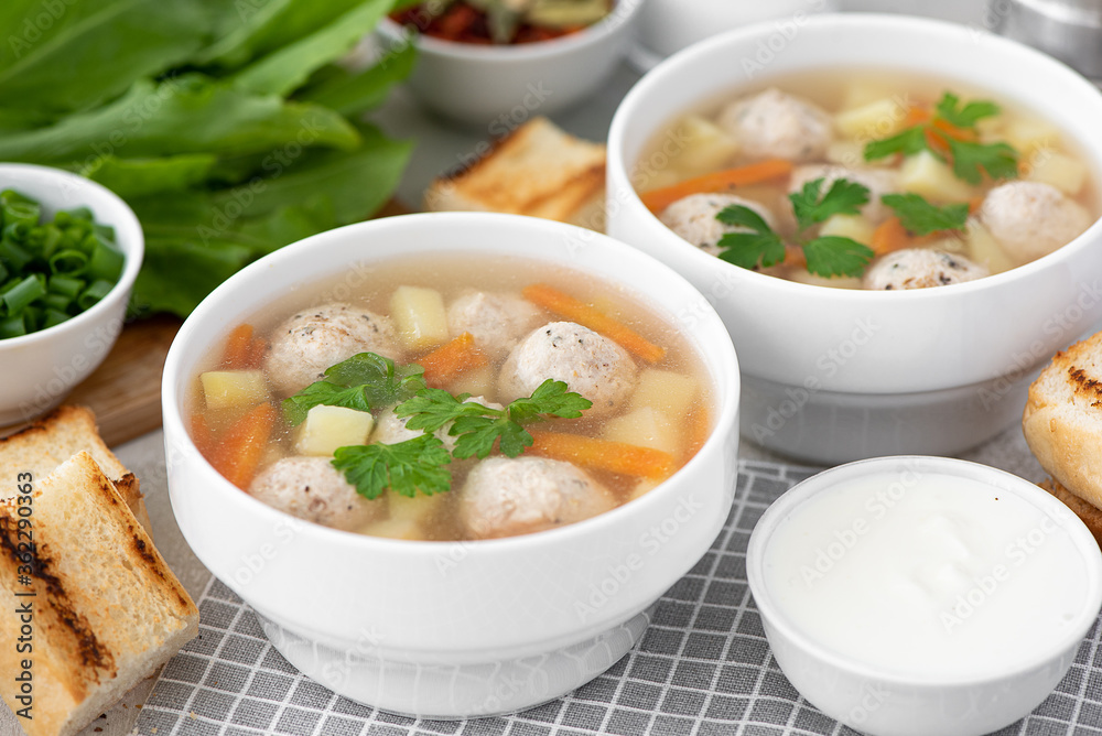 potato soup with meatballs, carrots and herbs potato soup with meatballs, carrots and herbs