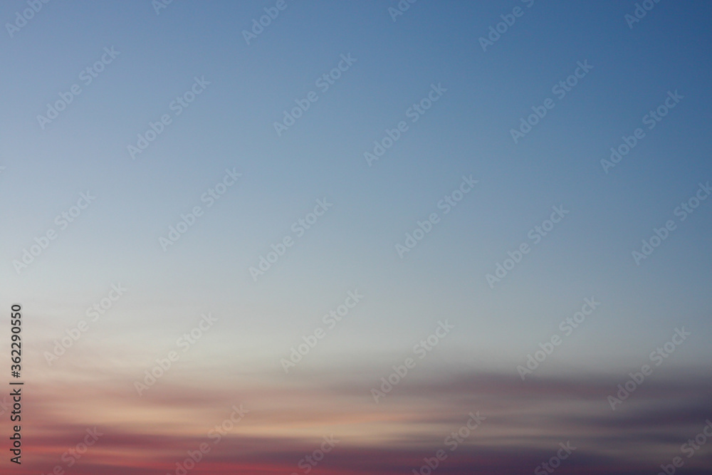 Obraz premium Blue Sky Photo View Background. Red and blue sky at sunset