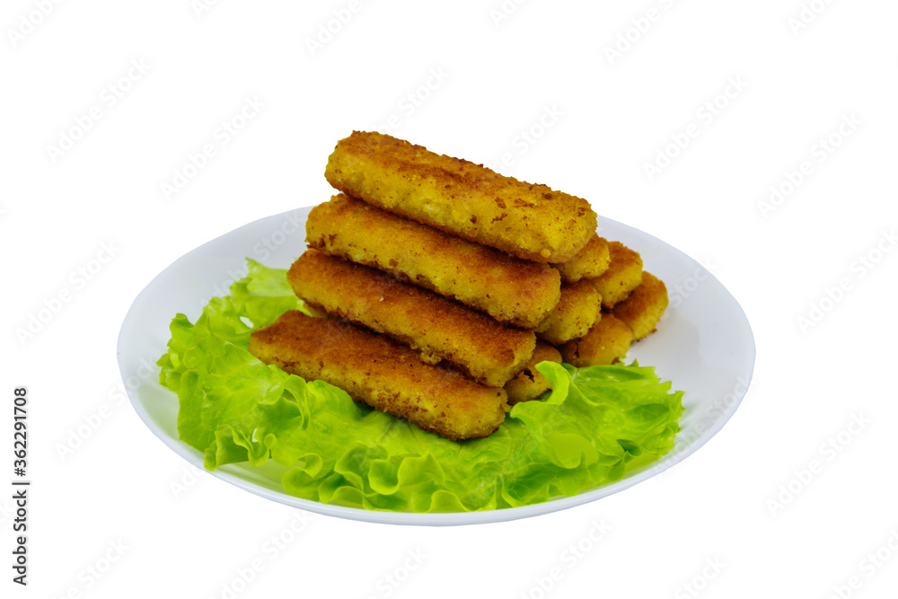 Fried fish fingers on a plate with lettuce isolated on white background Fried fish fingers on a plate with lettuce isolated on white background