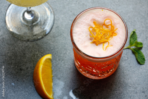 Alcoholic cocktails on a gray background photo