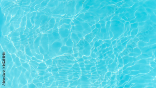 Blue water in the pool. Beautiful stains  abstract water background.