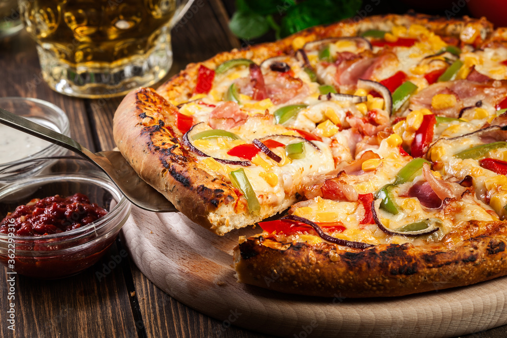 Homemade pizza with bacon, paprika and corn Homemade pizza with bacon, paprika and corn