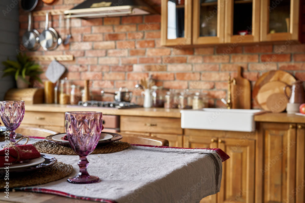 Serving for dinner on kitchen table. Warm kitchen background interior. Mockup. Serving for dinner on kitchen table. Warm kitchen background interior. Mockup.