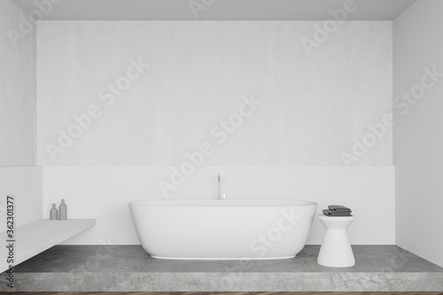 White bathroom interior with tub and shelf