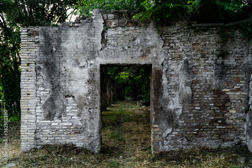 old ruins of a stone wall with door, Rome, Italy