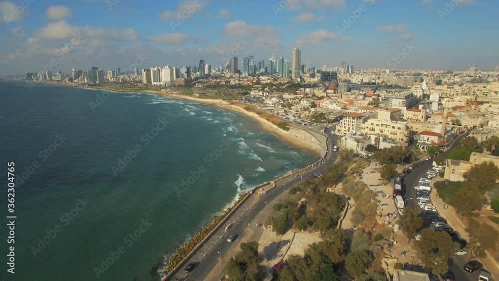 Tel Aviv Jaffa, Aerial View, Flying Over Old Jaffa Port and Saint Peter's church At Golden Hour, Tel-Aviv Skyline and the Mediterranean Sea, Israel - fly back