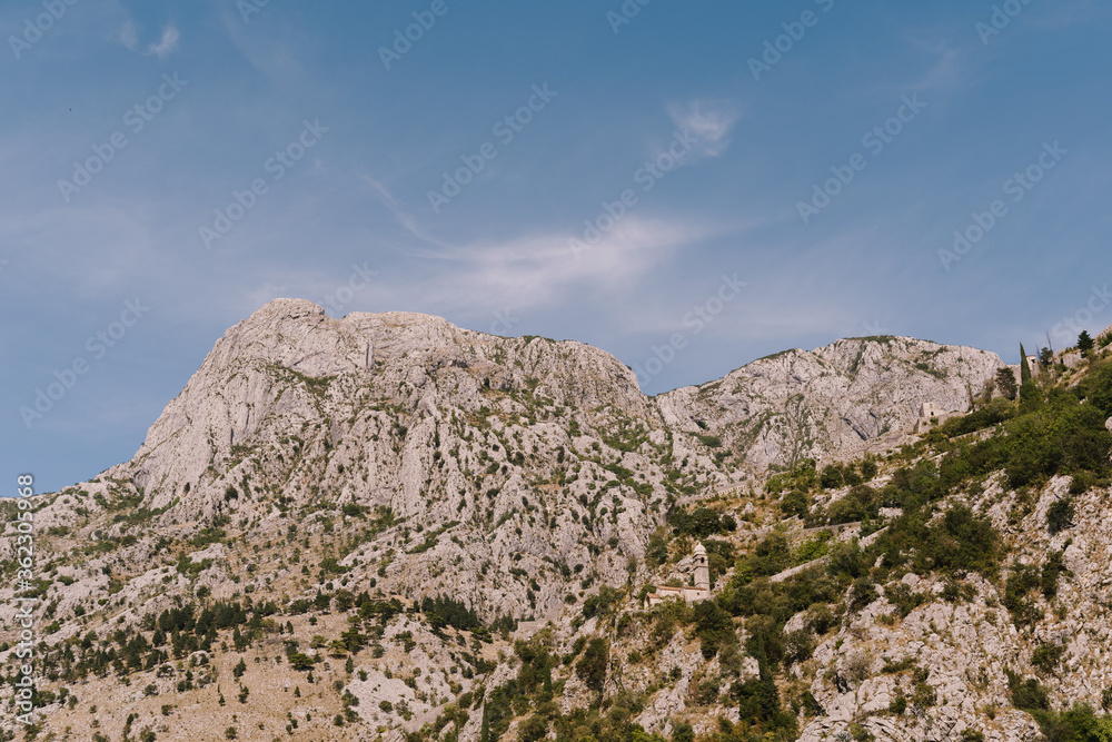 The tops of the rocky mountains in Boka Kotorska, in Montenegro, in Kotor Bay.