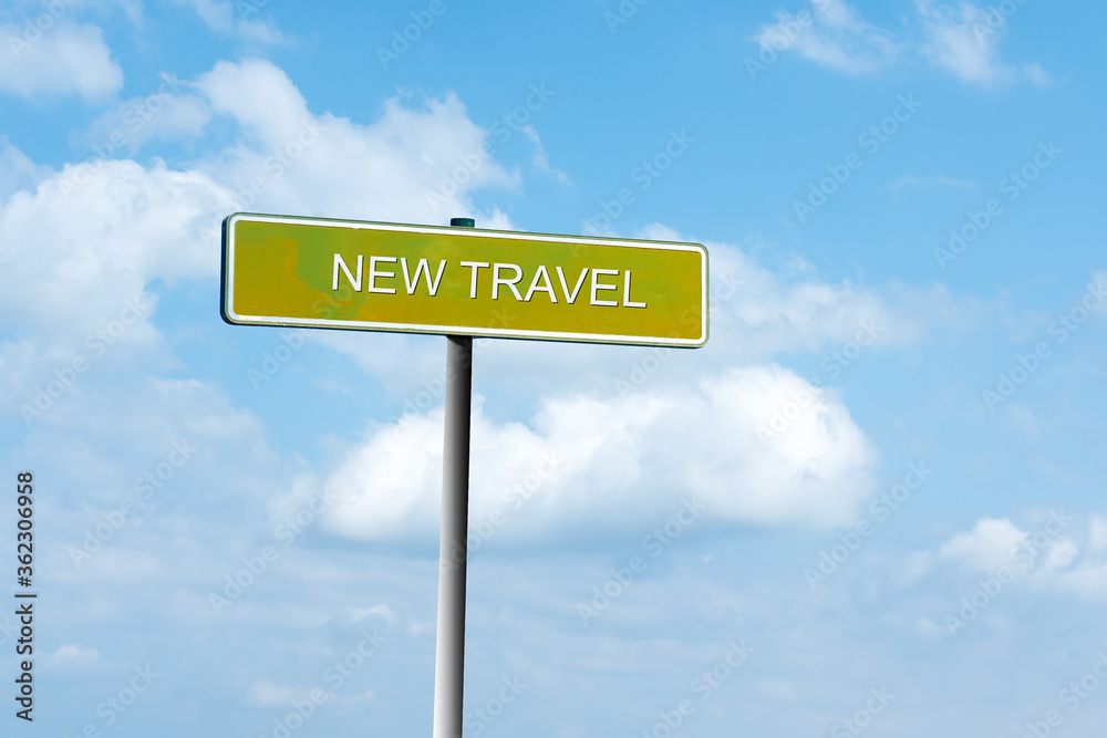 New Travel. Road sign against a blue cloudy sky. New impressions. New Travel. Road sign against a blue cloudy sky. New impressions.