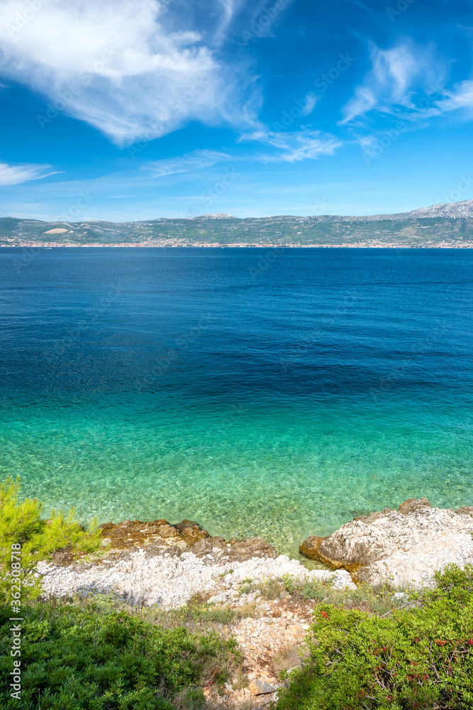 Rocky shore with turquoise sea water in Croatia