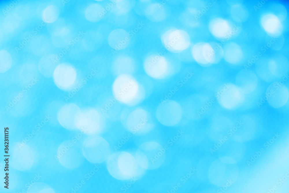 clear white bokeh blur abstract background from photo of water drop on blue plastic net. clear white bokeh blur abstract background from photo of water drop on blue plastic net.