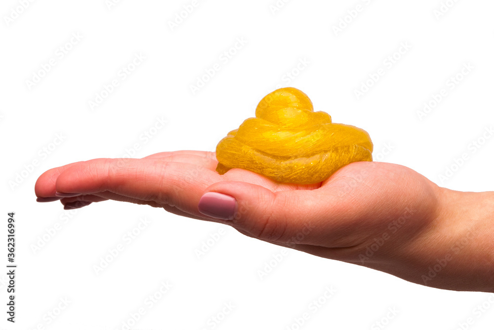 a toy for children mucus and liquid flowing on hand on a white background a toy for children mucus and liquid flowing on hand on a white background