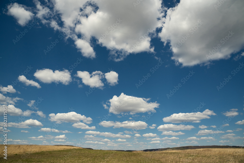 beautiful photo of blue sky with clouds and field in Ukraine beautiful photo of blue sky with clouds and field in Ukraine
