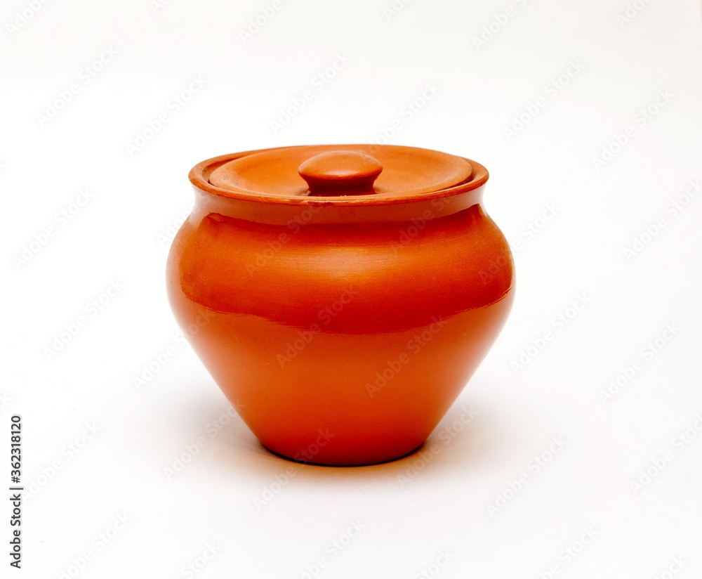 Clay pot with lid on white background Clay pot with lid on white background
