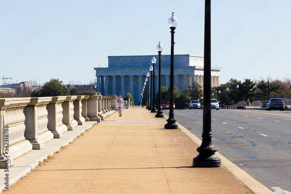 Iconic view looking eastwards along Arlington Memorial Bridge towards the Abraham Lincoln Memorial, Washington DC