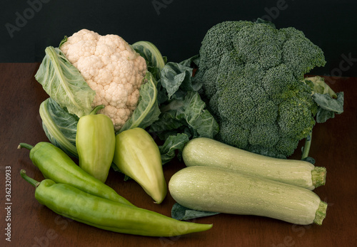 Etude with different fresh vegetables in green