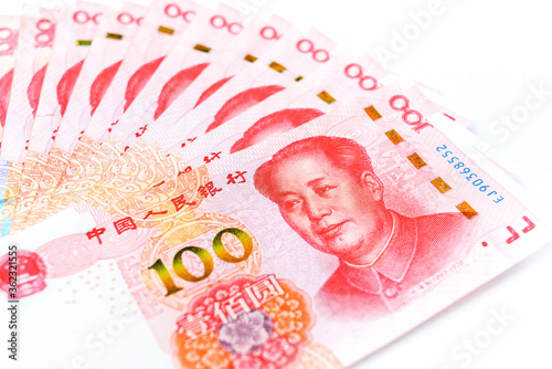 Official currency of China. Renminbi, abbreviation RMB. Yuan basic unit of the renminbi. Set of one hundred yuan close up. Chinese money. Business concept. photo