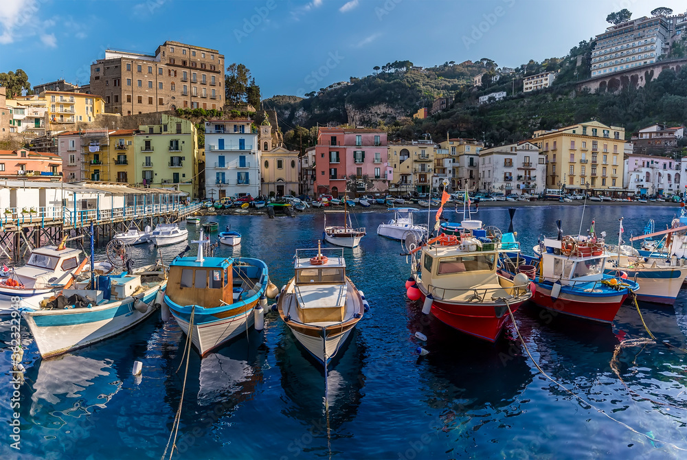 A panorama view of fishing boats moored in the Marina Grande, Sorrento, Italy